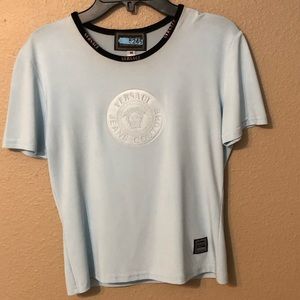 Ladies/Youth lite blue, size medium Versace top.